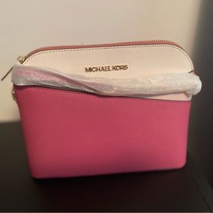 Brand new Michael Kors bag. Never worn, original price $397.